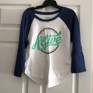 Active baseball style long sleeve. Never worn.